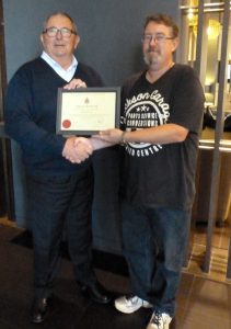 Russ Crane presents JK Hon Membership certificate